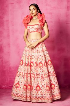 Light pink organza lehenga with an attached cancan and velvet patchwork, thread and mirror embroidery. Comes with a padded blouse and a velvet draped shrug.
Components: 3
Pattern: Embroidered
Type Of Work: Velvet patchwork, Thread, Mirror
Neckline: Sweetheart
Sleeve Type: Sleeveless
Fabric: Organza, Shrug: Velvet
Color: Pink
Other Details: 
Closure:
Lehenga: Side zip and Drawstrings
Blouse: Back hooks
Note: Jewellery worn by the model is not for sale.
Occasion: Destination Wedding - Aza Fashions Pink Pre-draped Saree With Intricate Embroidery For Navratri, Pink Anarkali Pre-draped Saree With Intricate Embroidery, Pink Tissue Silk Choli With Intricate Embroidery, Pink Pre-draped Saree With Intricate Embroidery For Reception, Pink Organza Lehenga With Cutdana, Pink Chanderi Pre-draped Saree With Intricate Embroidery, Pink Raw Silk Pre-draped Saree For Reception, Pink Tissue Silk Dress For Navratri, Pink Organza Lehenga With Pallu