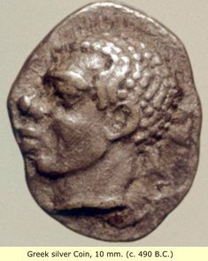 an ancient roman coin with a man's head on it