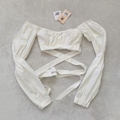 Reposhing This Item I Purchased From @Radicalregina. Loved It, But Ready To Rotate For Something New. Questions? Leave A Comment Below! White Bandage Top For Spring, Spring White Bandage Tops, Spring Cropped Bandage Top, White Bandage Crop Top For Spring, Tan Bodysuit, Flowy Crop Top, Black Sheer Top, Tie Shirt, Tie Crop Top