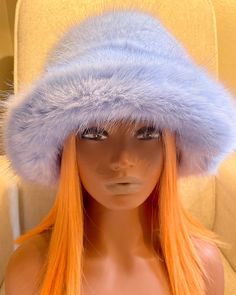 This beautiful incredibly soft faux fur hat is a must have for the fall and winter season.It is stylish and warm and can be dressed up or down. The head circumference of the hat is about 22-23inches (56-58cm) so almost everyone should fit :)  The hat is made out of Vegan Fur and is super soft and fluffy:) For any different color requests please send me an email:) Winter Faux Fur Bucket Hat, Brimmed Faux Fur Hat For Winter, Winter Brimmed Hat In Faux Fur, Adjustable Faux Fur Hats With Lining, Faux Fur Hat With Short Brim, Fluffy Faux Fur Wide Brim Hat, Faux Fur Hats With Short Brim, Adjustable Brimmed Faux Fur Hat, Trendy Fluffy Winter Hats