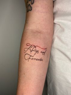 a person with a tattoo on their arm that says, always and frieven