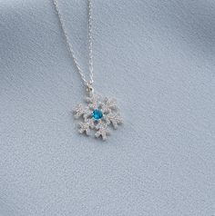 ✥ Radiating festive charm and elegance, this round cut diamond sparkling snowflake necklace is the ideal Christmas gift. This necklace perfectly captures the beauty and sparkle of winter with its exquisitely detailed snowflake design set with sparkling round cut diamonds. The brilliant diamonds add a stunning accent to any holiday ensemble, and the fine craftsmanship guarantees long-lasting luxury. This snowflake necklace is a unique and entrancing gift that will brighten her holiday season and become a beloved addition to her jewelry collection. It's perfect for celebrating Christmas or surprising someone special. ✦ Stone Details:✧ Stone Type: Moissanite✧ Stone Cut: Round Cut✧ Stone Total Weight: 0.35CT✧ Color: DEF✧ Clarity: VVS✧ Make: Hight Quality Craftmanship ✦ Metal Details✧ Metal Typ Snowflake Necklace, Celebrating Christmas, Snowflake Design, Jewelry Images, Rose Gold Metal, Snowflake Designs, Designer Engagement Rings, Stone Cuts, Design Set