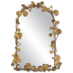 a mirror that has some leaves on it