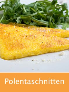 an omelet on a plate with greens and the words polentaschnittenn