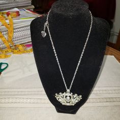 Beautiful Silver Tone Crown Necklace With Clear Rhinestones Through Out. All Stones Are Present. The Necklace Can Be Turned Into A Brooch. The Chain Is About 9.5" Long On The Picture. The Brooch Is About 2" Wide And About 2" High. This Is Absolutely Beautiful And Comes In The Original Box Which Is In Great Condition. A Great Gift For That Special Little Princess. Costume Rhinestone Necklace For Gifts, Crystal Crown Jewelry For Gifts, Crown Shaped Rhinestone Jewelry For Gifts, Crown Necklace, Clear Eyes, Eye Frames, Peach Roses, Betsy Johnson, Pink Cat