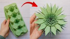 someone is making a paper flower out of an egg carton and then it's cut into smaller pieces