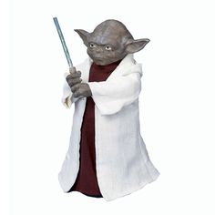 a statue of yoda holding a wand