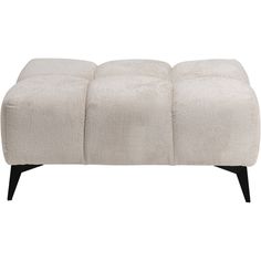 the footstool is made out of white fabric