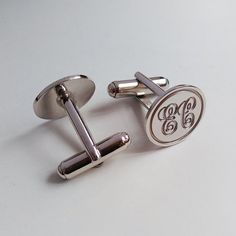 Groom Wedding Gift,Silver Men CuffLinks,Engraved Monogram CuffLinks,Gift for Fathers Day,Elegant Monogrammed CufflinksSmart and classy, silver monogram finish makes a wonderful personalized gift with his initialsPersonalize these cuffs with his initials (2-3 letters) and choose 925 sterling silver / 18k gold plated / white gold plated finish.* Please note the initials in the order you wish for them to appear. Traditionally a monogram is in this order: First, Last,Middle *Metal type: choice of 92 Luxury Modern Round Cufflinks, Monogram Cufflinks, Groom Wedding Gift, Monogrammed Cufflinks, Initial Cufflinks, Gift For Fathers Day, Wedding Cufflinks, Wedding Gifts For Groom, Silver Monogram