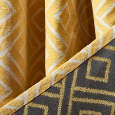 yellow and grey fabric with white lines on it