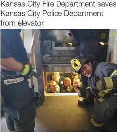 the fireman is smiling as he puts his helmet on another firefighter's head