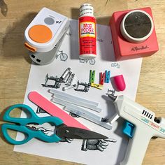 some crafting supplies are laying out on a table