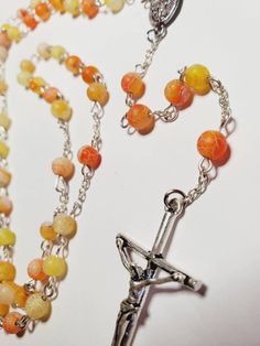 Handmade orange and yellow rosary Yellow Spiritual Rosary As Gift, Adjustable Amber Handmade Rosary, Yellow Rosary, Blue Rosary, Starfish Bracelet, Jaune Orange, Orange And Yellow, Beaded Necklaces, Blue Bracelet