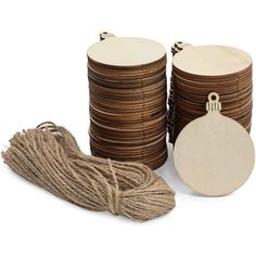 some brown and white items are on a white surface with twine, tags, and rope