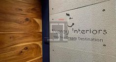 the sign on the side of a building that says through interiors we're for dream destination