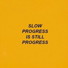 the words slow progress is still progress written in black on a yellow background