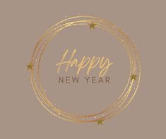 a happy new year card with gold stars and sparkles in a circle on a gray background