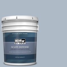 a white paint bucket with the label behr ultra stain and primer in one