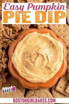 homemade pumpkin pie dip in an orange bowl surrounded by crackers