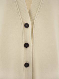 This cardigan characterised by essential lines combines a relaxed style with special details such as rib knitting. The wool, silk and cashmere composition makes the garment soft and warm. - Button fastening - V-neck - Ribbed knit DESIGNER ID: MAD214F034N128 25Composition: 75% Virgin wool, 15% Silk, 10% Cashmere Buttons Real horn Rib Knitting, Outfits Chic, Cashmere Cardigan, Emilio Pucci, Yoga Wear, Denim Pant, Relaxed Style, Knitting Designs, Lanvin