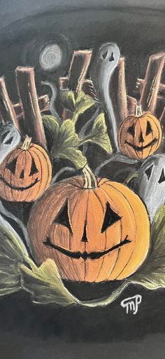 a drawing of halloween pumpkins with jack - o'- lanterns in the background