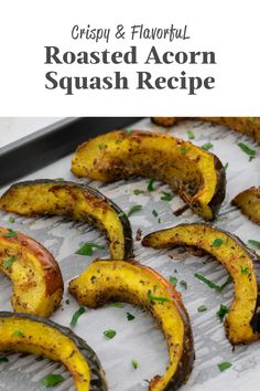 roasted acorn squash recipe on a baking sheet with the title text overlay reads crispy and flavorful roasted acorn squash recipe