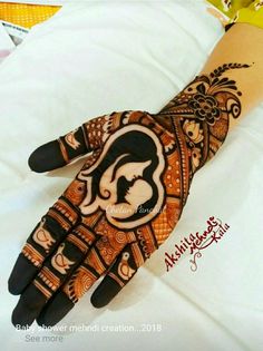 a henna design on someone's hand