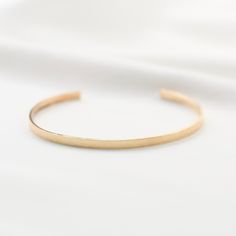 "14K gold cuff bracelet. 14K Gold Minimalist Cuff Bracelet * 14K solid gold. It is about 3mm x 1mm Please select the size of your wrist. If your wrist is 6\", please purchase 6\" bracelet. (If you order a 6\" bracelet, actual cuff length will be 5\" plus 1 inch opening.) Please read our policies before you place your order. https://www.etsy.com/shop/SashJewelry/policy?ref=shopinfo_policies_leftnav To see other Mother daughter necklace set click here: https://www.etsy.com/shop/SashJewelry?section 14k Gold Polished Minimalist Cuff Bracelet, Minimalist 14k Gold Cuff Bracelet With Polished Finish, Adjustable Minimalist Gold Bracelet With Polished Finish, Adjustable Yellow Gold Minimalist Cuff Bracelet, Minimalist Adjustable Yellow Gold Cuff Bracelet, Minimalist Yellow Gold Cuff Bracelet For Formal Occasions, Minimalist Polished Cuff Bracelet For Wedding, Minimalist Wedding Cuff Bracelet With Polished Finish, Minimalist Yellow Gold Cuff Bracelet For Everyday