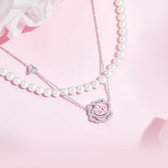 Be bold and dynamic, yet still retain a sense of delicacy and refinement, much like the combination of a flower petal and metal. Our "Rose Amour" Collection showcases an elegant rose design, reflecting the beauty and charm of love blossoming. At the center of each creation, a vibrant pink heart stone serves as a symbol of the passion, warmth, and devotion that are integral to every meaningful relationship. Immerse yourself in the dazzling world of the "Rose Amour" Collection and let its alluring Elegant Rose-colored Floral Jewelry, Elegant Roses Shaped Jewelry, Elegant Rose-colored Jewelry With Rose Design, Elegant Rose Jewelry For Mother's Day, Elegant Rose Design Rose-colored Jewelry, Elegant Silver Necklace With Rose Design, Elegant Rose Jewelry With Flower Charm, Feminine Rose Jewelry For Valentine's Day, Elegant Rose Flower Necklace With Rose Design