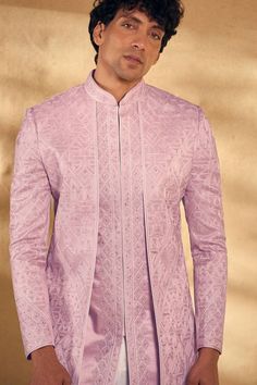 Onion pink overlap panel sherwani with embroidered geometric patterns. Comes with pant. - Aza Fashions Pink Long Sleeve Bandhgala With Cutdana, Fitted Pink Sherwani With Chikankari Embroidery, Designer Fitted Pink Kurta, Pink Fitted Sherwani With Chikankari Embroidery, Designer Pink Fitted Kurta, Pink Bandhgala With Intricate Embroidery And Traditional Drape, Designer Fitted Pink Sherwani, Pink Bandhgala With Intricate Embroidery, Designer Festive Pink Sets