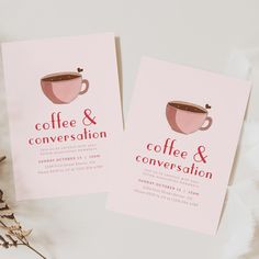 two pink coffee and conversation cards sitting on top of a table