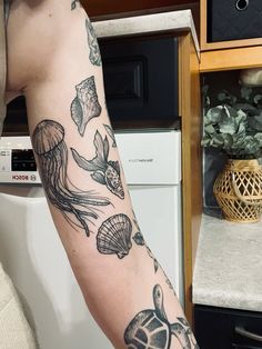 a person with a tattoo on their arm