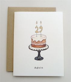 a birthday card with a cake on it and the number twenty two candles lit up