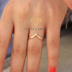 Made in solid 14k rose gold but also available in yellow gold and white gold, this beautiful V Shaped Chevron ring will pair beautifully with your engagement ring or you can wear it as an every day ring. Because this ring was made in solid and real 14k rose gold, you will not have to deal with the rose gold ever fading away.... Please send me a message If you would like to purchase this band with stones set on it... You Will Receive ♦14k rose gold V shaped chevron ring ♦Jewelry Box ------------- Rose Gold 14k Stackable Wedding Rings, Wedding Stackable 14k Rose Gold Rings, Rose Gold Stackable Wedding Rings, Rose Gold Open Band For Anniversary, Rose Gold Open Band For Wedding And Anniversary, V Shaped Wedding Band, Vanki Ring, Shaped Wedding Band, Wedding Band Curved