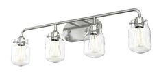 three light bathroom fixture with clear glass shades on the bulbs and chrome finish, in an industrial style