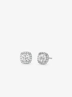 Perfect for daily wear these stud earrings channel a refined glamour. Crafted from sterling silver and available in two luxe platings this elegant pair features a cubic zirconia center that’s surrounded by pavé accents. Wear yours with everything from office-ready separates to evening ensembles. Michael Kors Earrings, Michael Kors Shop, Outfit Pieces, Thoughtful Gifts For Her, Michael Kors Jewelry, Grad Pics, Cz Stud Earrings, Jewelry Lookbook, Earrings Studs