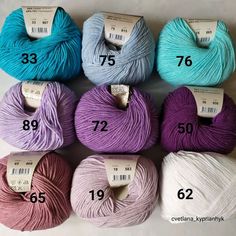 several skeins of yarn are shown with numbers on each skein and in different colors