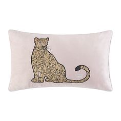 a pillow with a leopard design on the front and back of it's body