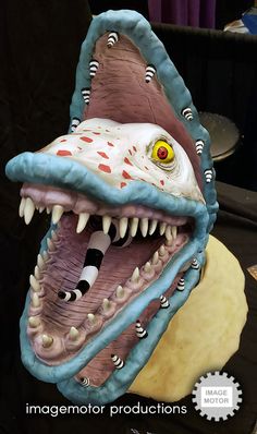 a close up of a fake shark's mouth with teeth and sharpy fangs