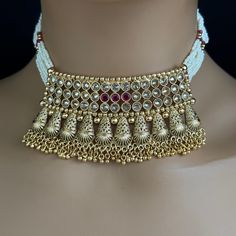 Ruby gold Polki Kundan choker Antique necklace wedding jewelry Indian Jewelry Pakistani Jewelry Wedding necklace Bridal necklace Regular Size And Adjustable Pearl Necklace Antique Necklace Set Dispatch in 1 business day Ships from California USA This is 100% Handmade jewelry. So the color, shades, and texture displayed may vary slightly from the actual product due to digital image limitations. We request you to consider these minor variations. Please expect the possibility of some slight imperfe Gold Pearl Necklace With Tilla For Diwali, Gold Tilla Necklace For Wedding, Ceremonial Gold Pearl Necklace With Tilla Detailing, Gold Pearl Necklace With Intricate Design For Reception, Ceremonial Gold Pearl Necklace With Tilla, Gold Pearl Necklace With Intricate Design For Wedding, Gold Traditional Pearl Necklace For Reception, Intricate Design Choker For Receptions And Festivals, Intricate Design Choker For Reception And Festivals