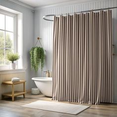 a bath room with a tub and a shower curtain