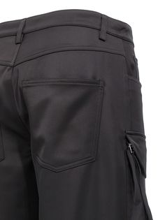 Cargo satin pants with maxi and multi pockets, wide legs, regular waist. Composition: 97% polyester, 3% elastane Workwear Bottoms With Functional Pockets, Functional Pockets Long Work Pants, Wide Leg Work Bottoms With Functional Pockets, Wide Leg Bottoms With Functional Pockets For Work, Full Length Work Pants With Functional Pockets, Workwear Pants With Functional Pockets, Wide Leg Pants With Functional Pockets For Workwear, Elastane Work Pants With Pockets, Fitted Cargo Pants With Functional Pockets For Work