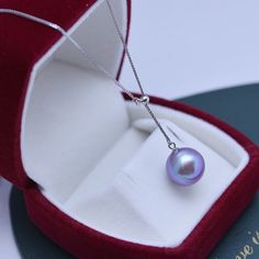 Freshwater pearls shimmer with very light overtones and classic purple body color seamlessly forming a single row of style distinction--an elegant look that only pearls can truly offer, setting them apart from any other gemstone or fine jewelry design. Materials: AAAA Freshwater Pearls, Size9-10mm, 925 sterling silver A FREE luxury jewelry box is included for high-quality pearl items. Product Information Pearl Type Freshwater Origin China Shape Round Quality AAAA Size 12-13 mm Nacre Very Thick C Elegant Purple High Luster Jewelry, Elegant High Luster Purple Jewelry, Elegant Purple Pearl Necklace For Formal Occasions, Elegant Purple Pearl Necklace For Wedding, Elegant Lavender Pearl Necklace With Round Beads, Elegant Purple Pearl Pendant Necklace, Elegant Purple Jewelry With Pearl Pendant, Elegant Lavender Round Bead Jewelry, Elegant Lavender Round Beaded Jewelry