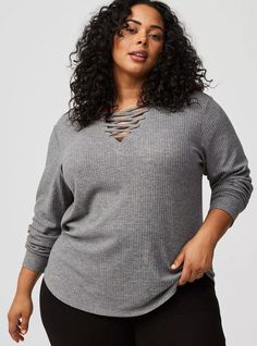 FIT Measures 31” from shoulder (size 2). MATERIALS + CARE Waffle knit fabric. 64% polyester, 33% rayon, 3% spandex. Machine wash cold. Tumble dry low. Imported. DETAILS V-shaped neckline. Long sleeves. The best plus size women's waffle lace up v-neck long sleeve sweatshirt top sweatshirts & hoodies in heather grey made of waffle. Torrid is your destination for cozy fall and winter clothes to keep you warm and comfortable. Long Sleeve Sweatshirt, Winter Clothes, Cozy Fall, Waffle Knit, Long Sleeve Sweatshirts, V Shape, Heather Grey, Knitted Fabric, Knit Fabric