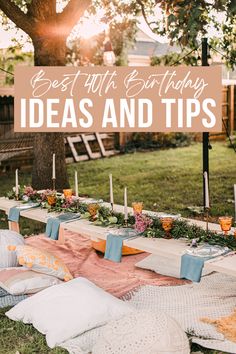 an outdoor birthday party with candles and blankets