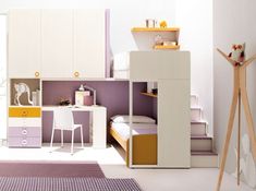 a bedroom with white and yellow furniture in the corner, purple rugs on the floor