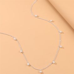 Pearl Decor Waist Chain This waist chain features lustrous freshwater pearls on a delicate silver chain. The adjustable design ensures a perfect fit, making it suitable for any occasion. Order yours today to add a touch of elegance to any outfit. Elegant Silver Pearl Chain Waist Chain, Elegant Silver Waist Chain With Pearls, Silver Waist Chain With Pearl Detail, Dainty Silver Adjustable Waist Chain, Adjustable Silver Delicate Waist Chain, Trendy Silver Pearl Necklace With Adjustable Chain, Dainty Adjustable Silver Waist Chain, Silver Dainty Adjustable Waist Chain, Adjustable Silver Dainty Waist Chain