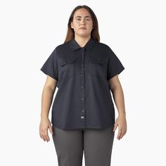 The Dickies Women’s Plus 574 Original Work Shirt offers a traditional workwear uniform style with a modern fit. It features our classic 574 style, perfect for the workplace. The shirt has a durable and comfortable cotton and polyester blend, moisture-wicking technology, and an easy-care stain release finish. The classic work shirt detailing, front darts for optimal fit, and a back yoke for mobility will last for years. The dual front patch pockets have a button closure and are great for workplac Classic Short Sleeve Shirt With Button Closure For Work, Professional Cotton Work Shirt, Workwear Shirt With Welt Pockets, Solid Collared Short Sleeve Shirt For Work, Professional Cotton Tops For Workwear, Classic Button-up Short Sleeve Work Shirt, Professional Solid Color Shirt For Work, Professional Solid Color Work Shirt, Collared Utility Shirt For Work