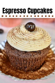 a close up of a cupcake on a plate with the words espresso cupcakes above it