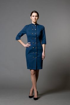 "A stylish tuxedo dress featuring double breasted closure, high neck collar, and a midi length. - stand collar - fitted wiggle silhouette - double-breasted closure with gold metal buttons - half sleeve - midi length - blazer style Fiber: cotton - 95%, elastane - 5% Deep blue color (teal) Our model wears size S (US 8) and is 171cm/5'6\" tall, Dress length - 38'' / 97 cm SIZE CHART XS __ EU 34 __ US 4 bust: 31,5\" | 80 cm waist: 24,5\" | 62 cm hips: 34,5\" | 88 cm S __ EU 36 __ US 6 bust: 33,0\" | Tailored Knee-length Blazer Dress With Buttons, Semi-formal Knee-length Blazer Dress With Buttons, Double-breasted Office Dress With Double Button Closure, Tailored Knee-length Jacket Dress With Buttons, Classic Career Dresses With Buttons, Double-breasted Jacket Dress For Work, Double-breasted Office Jacket Dress With Button Closure, Semi-formal Double-breasted Button Dress, Semi-formal Double-breasted Jacket Dress With Buttons